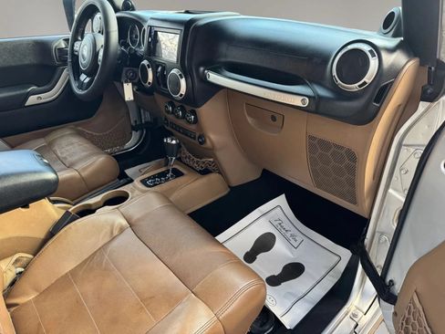 Used 2012 Jeep Wrangler Unlimited Sahara w/ Dual Top Group AWD/4WD image 10
