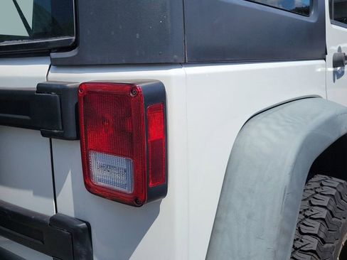 Used 2012 Jeep Wrangler Unlimited Sport w/ Max Tow Pkg AWD/4WD image 10