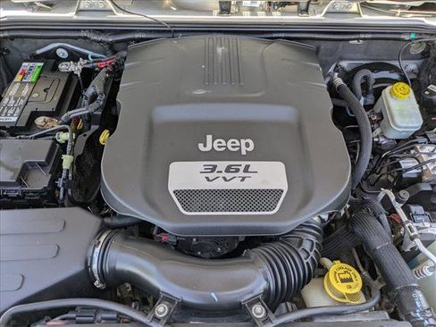 Used 2012 Jeep Wrangler Unlimited Sport w/ Connectivity Group AWD/4WD image 19