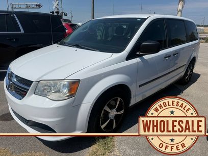 Used 2016 Dodge Grand Caravan American Value Package w/ UConnect Hands-Free Group