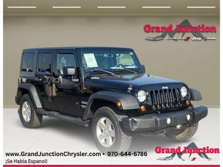 Used 2013 Jeep Wrangler Unlimited Sport AWD/4WD video 1