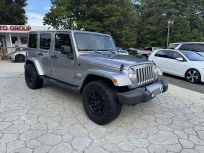 Used 2015 Jeep Wrangler Unlimited Sahara w/ Dual Top Group
