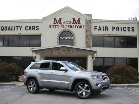 Used 2015 Jeep Grand Cherokee Limited AWD/4WD image 1