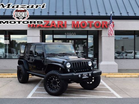 Used 2015 Jeep Wrangler Unlimited Sahara AWD/4WD image 1