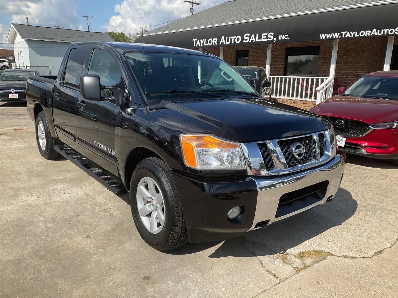 Used 2013 Nissan Titan SV w/ SV Premium Utility Pkg RWD image 1