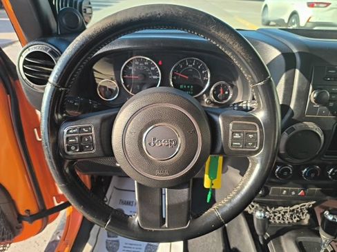 Used 2012 Jeep Wrangler Unlimited Sport w/ Black Appearance Group AWD/4WD image 23