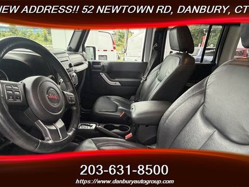 Used 2014 Jeep Wrangler Unlimited Sahara w/ Dual Top Group AWD/4WD image 11