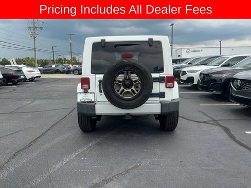 Used 2013 Jeep Wrangler Unlimited Sahara w/ Dual Top Group AWD/4WD image 4