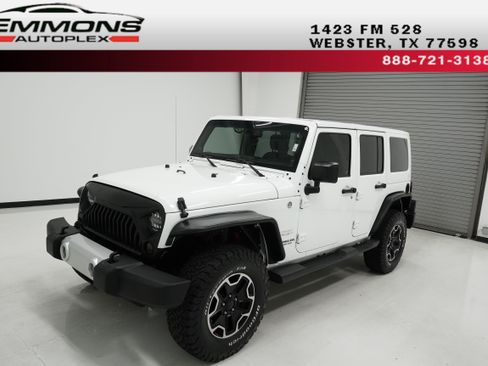 Used 2014 Jeep Wrangler Unlimited Sahara w/ Connectivity Group AWD/4WD image 1
