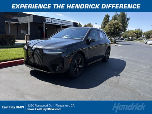 Used 2024 BMW iX xDrive50 w/ Premium Package AWD/4WD image 1