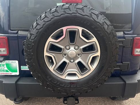 Used 2013 Jeep Wrangler Unlimited Rubicon w/ Dual Top Group AWD/4WD image 18