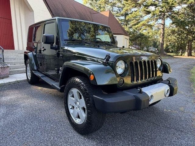 Used 2011 Jeep Wrangler Unlimited Sahara w/ Connectivity Group AWD/4WD image 4