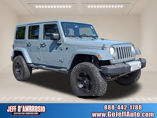 Used 2014 Jeep Wrangler Unlimited Sahara w/ Dual Top Group AWD/4WD image 1