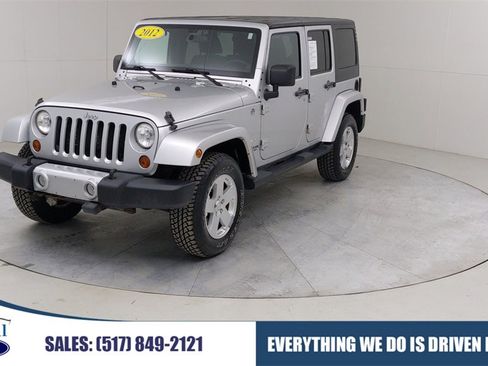 Used 2012 Jeep Wrangler Unlimited Sahara w/ Dual Top Group image 1