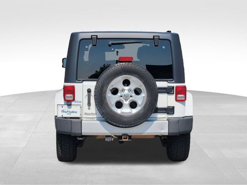 Used 2014 Jeep Wrangler Unlimited Sahara w/ Dual Top Group AWD/4WD image 3
