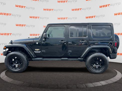 Used 2013 Jeep Wrangler Unlimited Sahara w/ Dual Top Group AWD/4WD image 2
