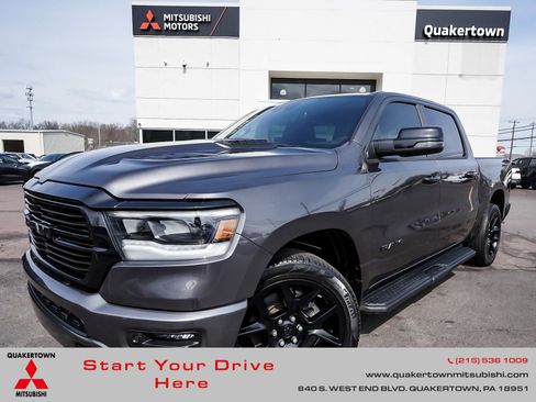 Used 2023 RAM 1500 Laramie AWD/4WD image 1