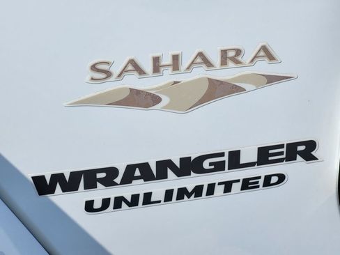 Used 2014 Jeep Wrangler Unlimited Sahara w/ Dual Top Group AWD/4WD image 13