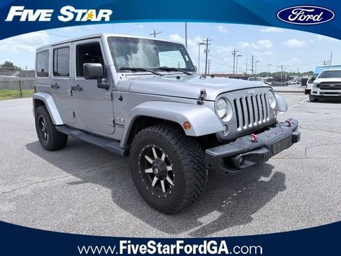 Used 2016 Jeep Wrangler Unlimited Sahara w/ Max Tow Package AWD/4WD image 1