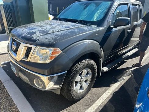 Used 2010 Nissan Frontier SE AWD/4WD image 1