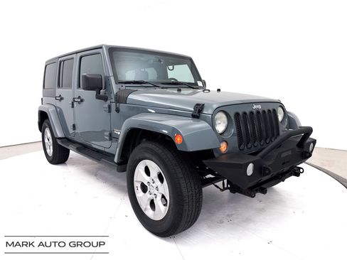 Used 2014 Jeep Wrangler Unlimited Sahara w/ Connectivity Group AWD/4WD image 1