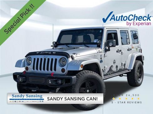 Used 2012 Jeep Wrangler Unlimited Sahara AWD/4WD image 1