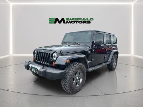 Used 2011 Jeep Wrangler Unlimited Sport w/ Dual Top Group AWD/4WD image 1