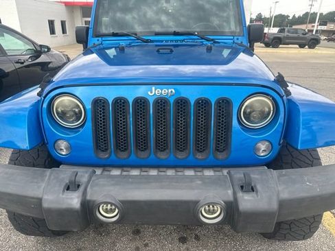 Used 2015 Jeep Wrangler Unlimited Sahara w/ Mopar Chrome Edition Group AWD/4WD image 3