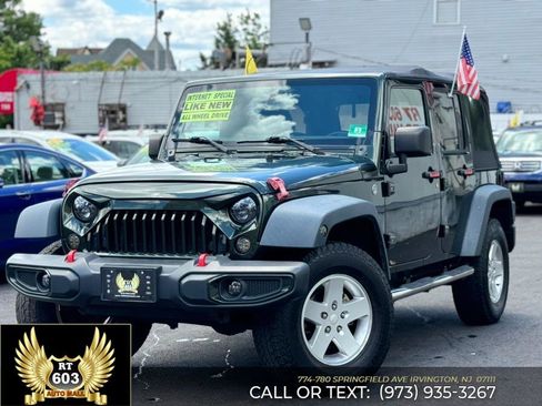 Used 2011 Jeep Wrangler Unlimited Sport image 1