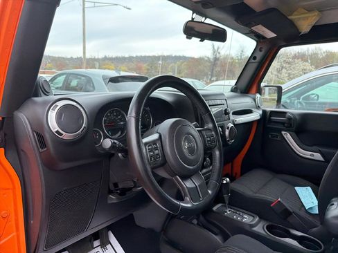 Used 2012 Jeep Wrangler Unlimited Sahara w/ Dual Top Group AWD/4WD image 14