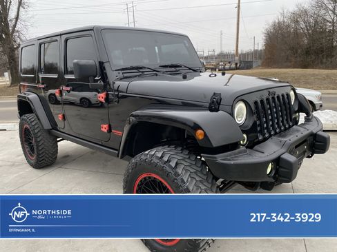 Used 2016 Jeep Wrangler Unlimited Sahara image 1