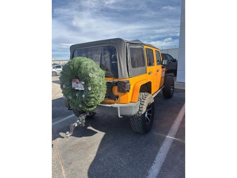 Used 2012 Jeep Wrangler Unlimited Rubicon w/ Dual Top Group image 4