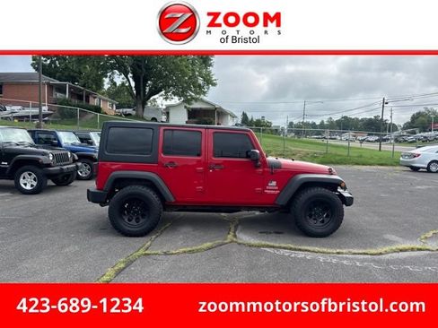 Used 2011 Jeep Wrangler Unlimited Sport AWD/4WD image 1