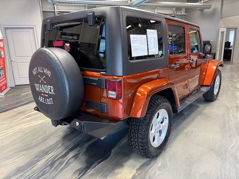 Used 2014 Jeep Wrangler Unlimited Sahara w/ Dual Top Group AWD/4WD image 28