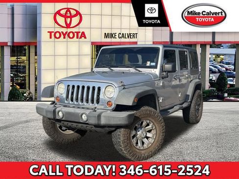 Used 2012 Jeep Wrangler Unlimited Sport AWD/4WD image 1