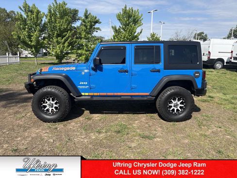 Used 2011 Jeep Wrangler Unlimited Sport AWD/4WD image 1