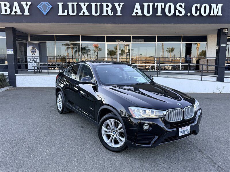 Used 2016 BMW X4 xDrive28i AWD/4WD image 1