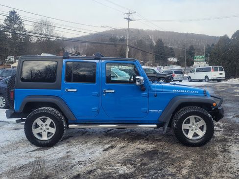 Used 2011 Jeep Wrangler Unlimited Rubicon w/ Dual Top Group image 9