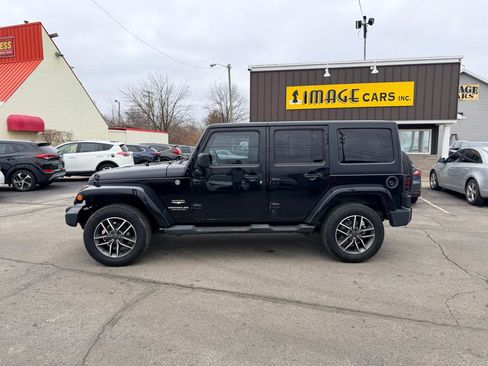 Used 2013 Jeep Wrangler Unlimited Sahara w/ Dual Top Group image 10