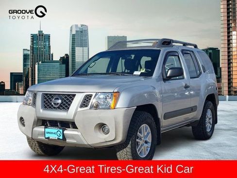 Used 2014 Nissan Xterra S image 1
