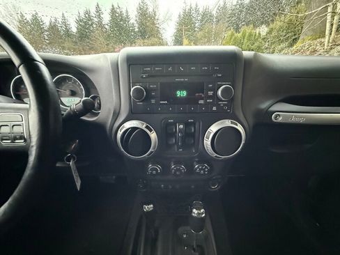 Used 2011 Jeep Wrangler Unlimited Rubicon w/ Dual Top Group AWD/4WD image 16