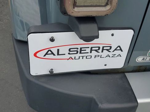 Used 2014 Jeep Wrangler Unlimited Sahara w/ Dual Top Group AWD/4WD image 6