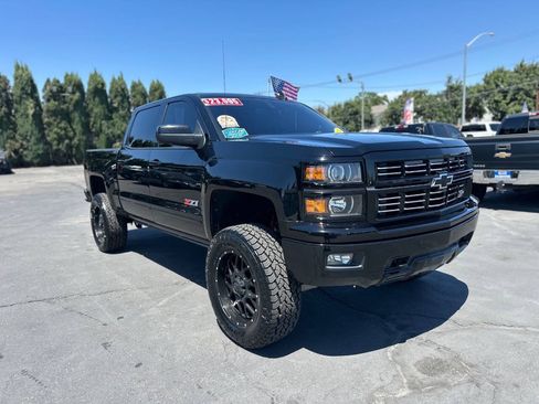 Used 2015 Chevrolet Silverado 1500 LTZ Z71 w/ Midnight Edition AWD/4WD image 1