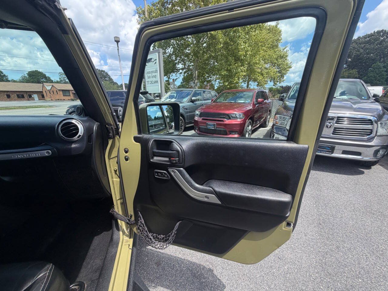 Used 2013 Jeep Wrangler Unlimited Sahara w/ Dual Top Group AWD/4WD image 24