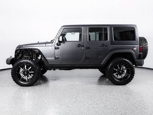 Used 2014 Jeep Wrangler Unlimited Rubicon w/ Dual Top Group AWD/4WD image 5