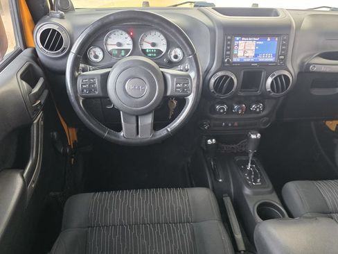 Used 2012 Jeep Wrangler Unlimited Sport w/ Connectivity Group AWD/4WD image 10