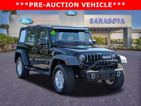 Used 2013 Jeep Wrangler Unlimited Sport AWD/4WD image 1