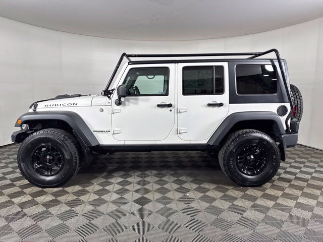Used 2010 Jeep Wrangler Unlimited Rubicon w/ Dual Top Group AWD/4WD image 7