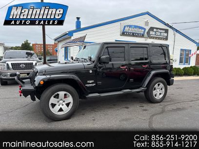 Used 2011 Jeep Wrangler Unlimited Sahara w/ Dual Top Group