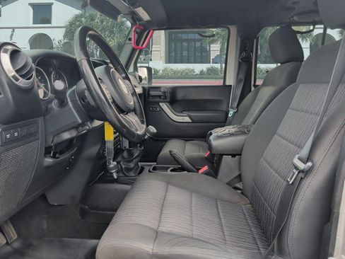 Used 2012 Jeep Wrangler Unlimited Rubicon w/ Dual Top Group AWD/4WD image 11